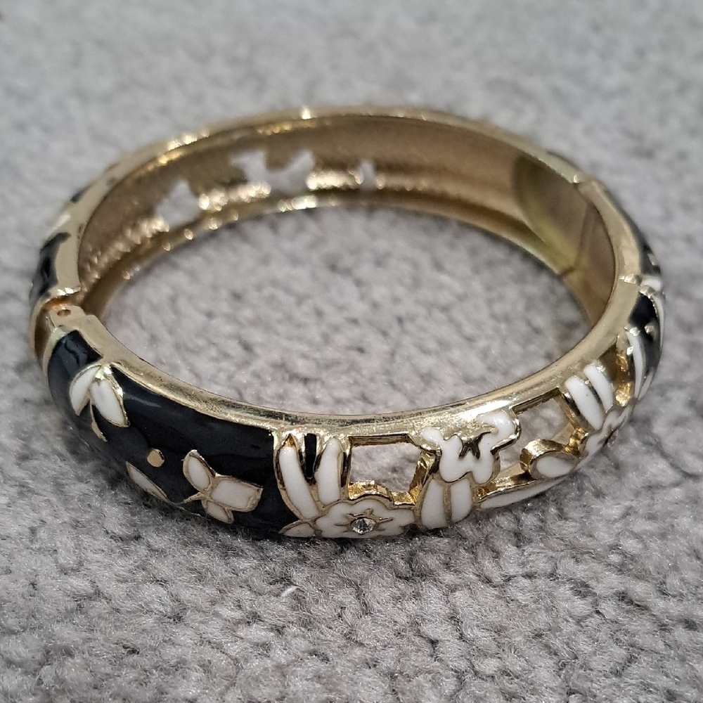 Elegant Gold and Black Floral Bangle